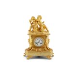 A FINE 19TH CENTURY ORMOLU MANTEL CLOCK, the white enamel dial inscribed Krauel a Troyes, the