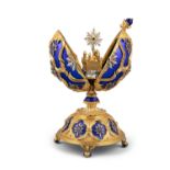 A FABERGÉ SILVER GILT AND BLUE ENAMEL 'STAR OF THE NORTH' EGG, modern, the Royal blue and diamond