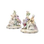 A PAIR OF DRESDEN PORCELAIN FIGURAL TABLE LAMPS, modelled as figures in 18th century attire, one