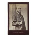 AN ORIGINAL PORTRAIT PHOTOGRAPH OF CHARLES STEWART PARNELL, in morning jacket. Captioned 'Charles S.