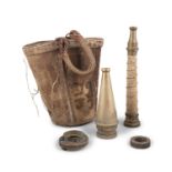 AN 18TH/19TH CENTURY CANVAS FIRE BUCKET, together with an assortment of brass hose nozzles and