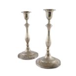 A PAIR OF GEORGE III SILVER CANDLESTICKS, Sheffield 1794, mark of John Green & Co., with urn