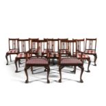 A SET OF TEN MAHOGANY FRAMED DINING CHAIRS, in the Georgian style, the rectangular backs with