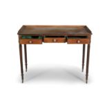 A GEORGE IV MAHOGANY SIDE TABLE, the rectangular top with gallery, above three frieze drawers,