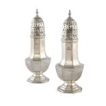 A PAIR OF EDWARDIAN SILVER FACETED BALUSTER SHAPED SUGAR CASTERS, Sheffield 1904, mark of Martin