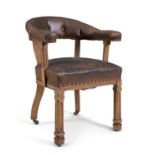 A PAIR OF PUGIN STYLE OAK FRAME TUB BACK CHAIRS, with brown leather button-back and square fluted