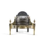 A GEORGE III SERPENTINE BRASS FIRE GRATE, c.1790, of classical form, with arched cast iron back