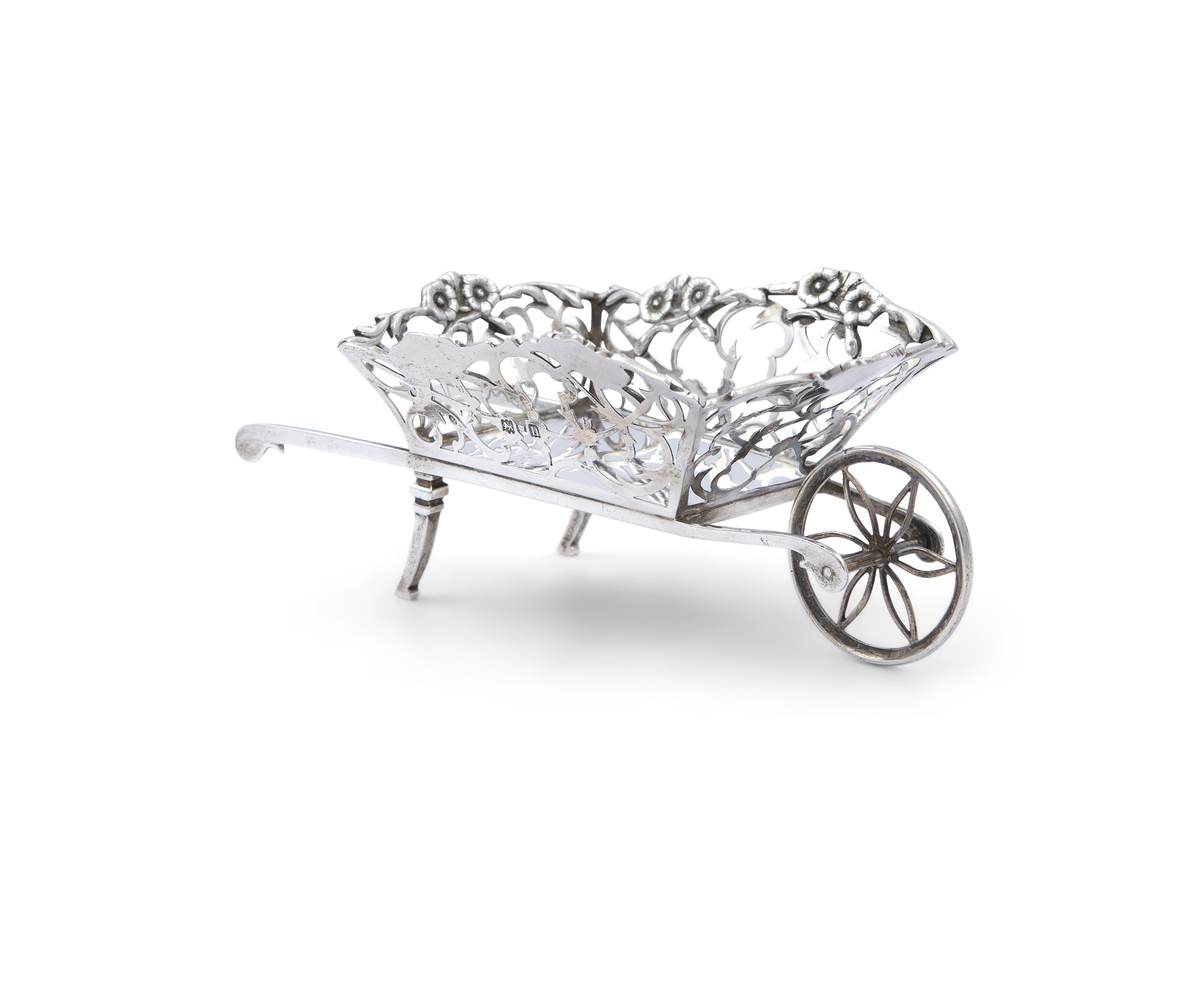 A NOVELTY SILVER BON-BON DISH IN THE FORM OF A WHEEL BARROW, London 1907, mark of William Comyns,