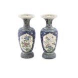 A PAIR OF JAPANESE SATSUMA EARTHENWARE VASES, c.1900, of baluster shape with flared rim, the blue