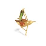 A GOLD AND ENAMEL NOVELTY BROOCH, designed as a bird perched on a gold branch, the gold bird