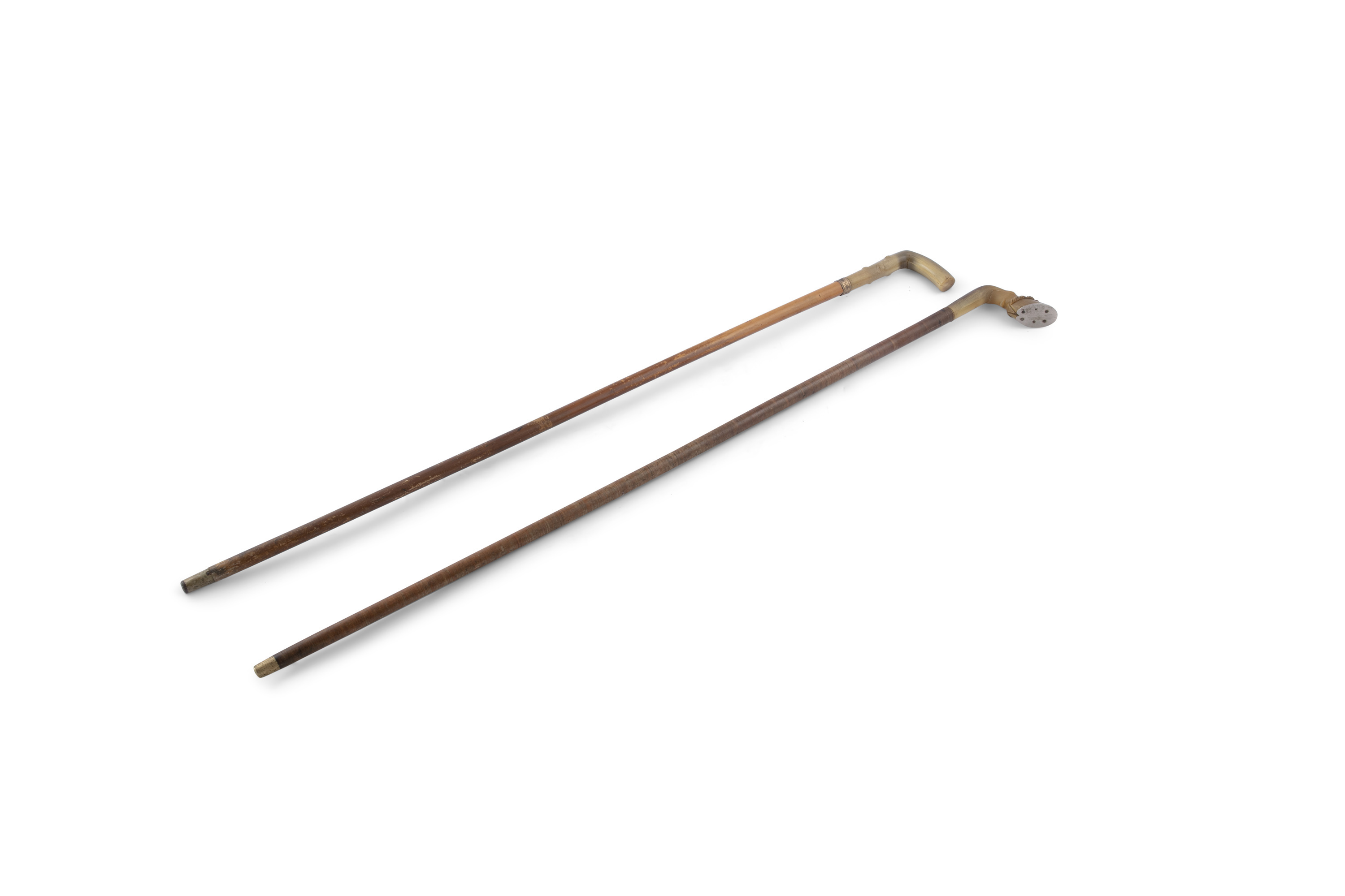 TWO HORNHANDLED WALKING CANES, each 85cm high