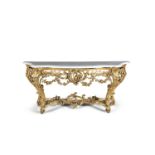 A CONTINENTAL GILTWOOD SERPENTINE CONSOLE TABLE, 19th century, fitted with Carrara marble top and