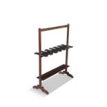 A VICTORIAN MAHOGANY BOOT RACK with 12 notch platform, 82cm wide, 107cm high