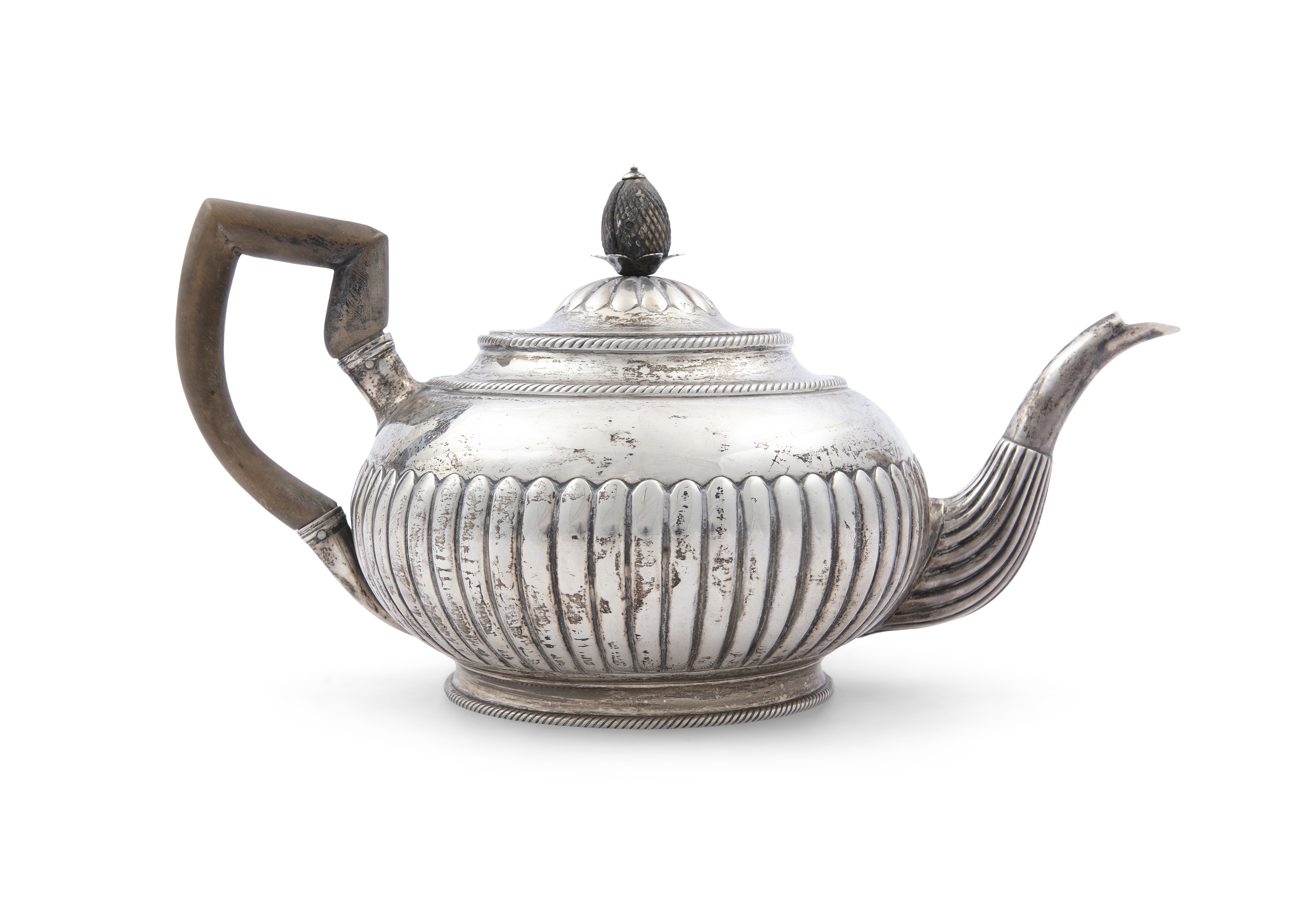 A GEORGE III IRISH SILVER TEAPOT, Dublin 1805, mark of Richard Sawyer, of circular form, the demi-