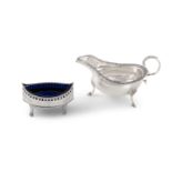 AN IRISH BRIGHT-CUT SILVER ENGRAVED NAVETTE SHAPED SALT CELLAR, Dublin 1785, mark Christopher