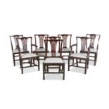 A SET OF EIGHT GEORGE III MAHOGANY FRAMED DINING CHAIRS, each with pierced vase shaped back, drop in