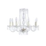 AN EIGHT BRANCH CLEAR GLASS CHANDELIER, mid 20th century, with domed corona and baluster centre