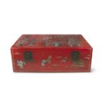 A CHINESE RED LACQUER CHEST, mid 20th entury of rectangular form, applied with side carrying handles