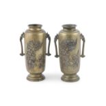 A PAIR OF JAPANESE BRONZE 'IKEBANA' VASES, 19th century, of cylindrical form, with stylised mask