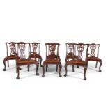 A SET OF EIGHT MAHOGANY FRAMED DINING CHAIRS, c.1920, in the Georgian style, comprising two