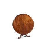 A FINE VICTORIAN ROSEWOOD CIRCULAR TILT TOP BREAKFAST TABLE, the top with moulded rim, on a turned