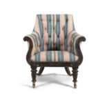 A WILLIAM IV ROSEWOOD FRAMED LIBRARY ARMCHAIR, upholstered in striped polychrome patterned fabric,