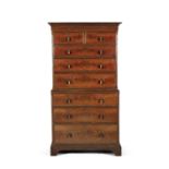 A 19TH CENTURY FLAME MAHOGANY CHEST ON CHEST, with cavetto and dentil cornice above two short and