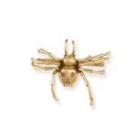 A GEM-SET NOVELTY BROOCH Realistically designed as a crawling spider, the engraved body accented