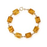 A RETRO CITRINE BRACELET, BY TIFFANY & CO., Circa 1950 Each rectangular-cut citrine interspersed