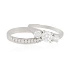 A DIAMOND SINGLE-STONE RING WITH HALF-ETERNITY DIAMOND RING The brilliant-cut diamond weighing 0.