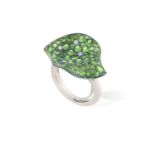 A TZAVORITE AND DIAMOND RING, BY MARGHERITA BURGENER Designed as a stylised petal, pavé-set