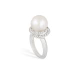 A CULTURED PEARL AND DIAMOND DRESS RING Set with a cultured pearl of cream tint measuring