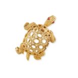 A NOVELTY BROOCH, BY CARTIER, CIRCA 1965 Designed as an openwork textured gold turtle, with cabochon