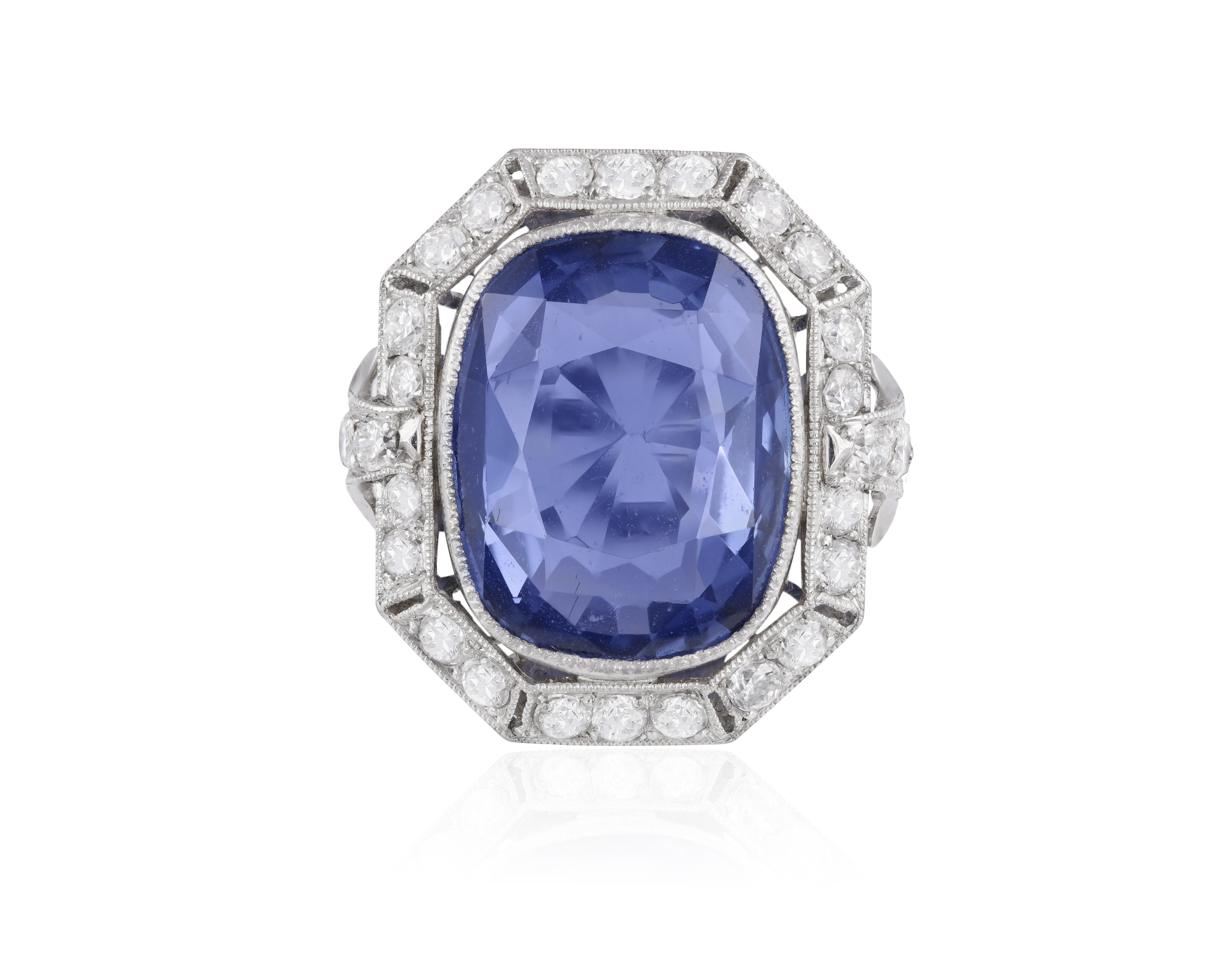 AN EARLY 20TH CENTURY SAPPHIRE AND DIAMOND RING The cushion-shaped sapphire weighing approximately - Image 2 of 3