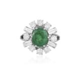 AN EMERALD AND DIAMOND CLUSTER RING, CIRCA 1960 The oval-shaped emerald weighing approximately 2.