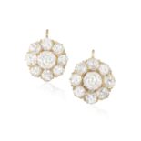 A PAIR OF DIAMOND CLUSTER EARRINGS Each formed as a daisy-shaped diamond cluster of old brilliant