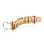A RUBY AND DIAMOND BRACELET The articulated large bracelet composed of domed polished gold tubular