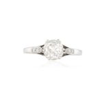 AN EARLY 20TH CENTURY DIAMOND SINGLE-STONE RING The old cushion-shaped diamond weighing