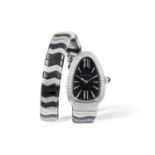 A LADY'S 'SERPENTI TUBOGAS' STAINLESS STEEL, CERAMIC AND DIAMOND-SET SERPENTINE BRACELET WATCH, BY
