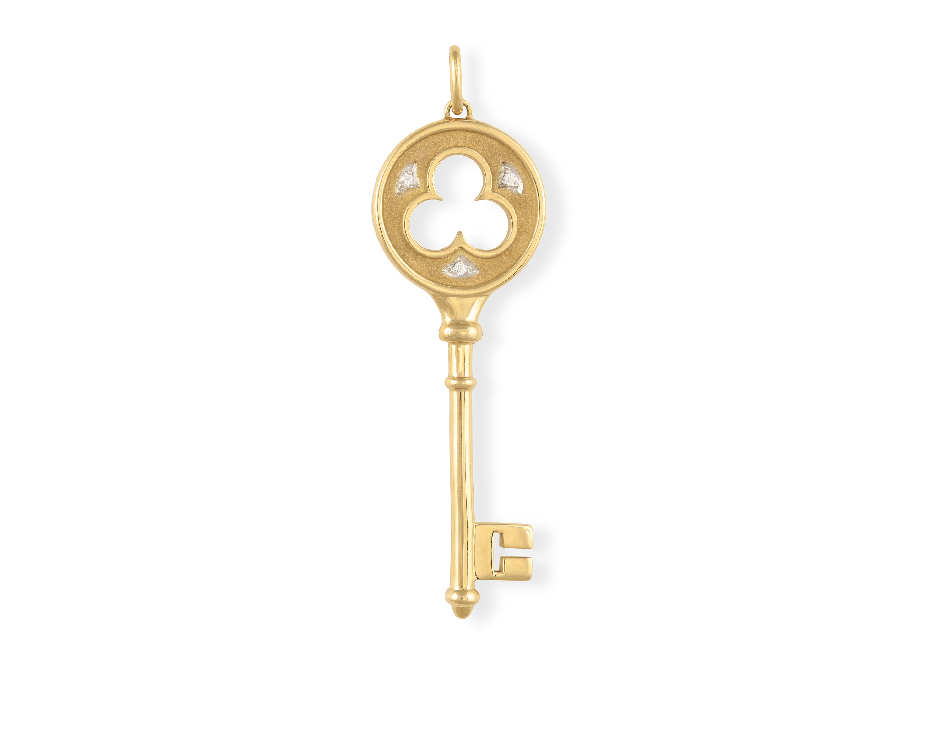 A DIAMOND KEY PENDANT BY TIFFANY & CO Designed as a stylised key, the head highlighted with three