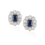 A PAIR OF SAPPHIRE AND DIAMOND CLUSTER EARCLIPS Each cushion-shaped sapphire collet-set at the