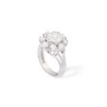 A DIAMOND CLUSTER RING The central old European-cut diamond weighing approximately 1.70ct within a