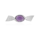 AN AMETHYST 'SWEET' BROOCH, BY BULGARI, CIRCA 2015 Designed as a sweet wrapper set with a central