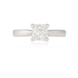 A DIAMOND SINGLE-STONE RING The square radiant-cut diamond within a four-claw setting and plain