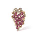 A RUBY AND DIAMOND CLIP BROOCH, CIRCA 1880 Designed as a fruiting vine, the branch set with