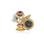 A RARE RETRO RUBY AND DIAMOND LAPEL WATCH BROOCH, CIRCA 1945 The stylised flower within a polished