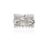 A DIAMOND RING Designed as a continuous foliate lattice with honeycomb detail, accented by