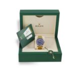 A FINE 18K GOLD 'SUBMARINER' CALENDAR BRACELET WATCH, BY ROLEX, 2017 The 31-jewel Cal. 3135