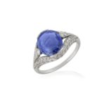 A BELLE EPOQUE SAPPHIRE AND DIAMOND RING, CIRCA 1910 The oval mixed-cut sapphire weighing