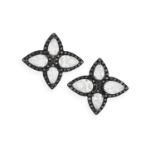 A PAIR OF DIAMOND AND BLACK DIAMOND EARRINGS Each cluster set with four pear-shaped diamonds, to a